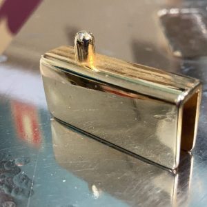 Bisagra cristal oro punto de giro